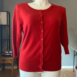 Red button up sweater